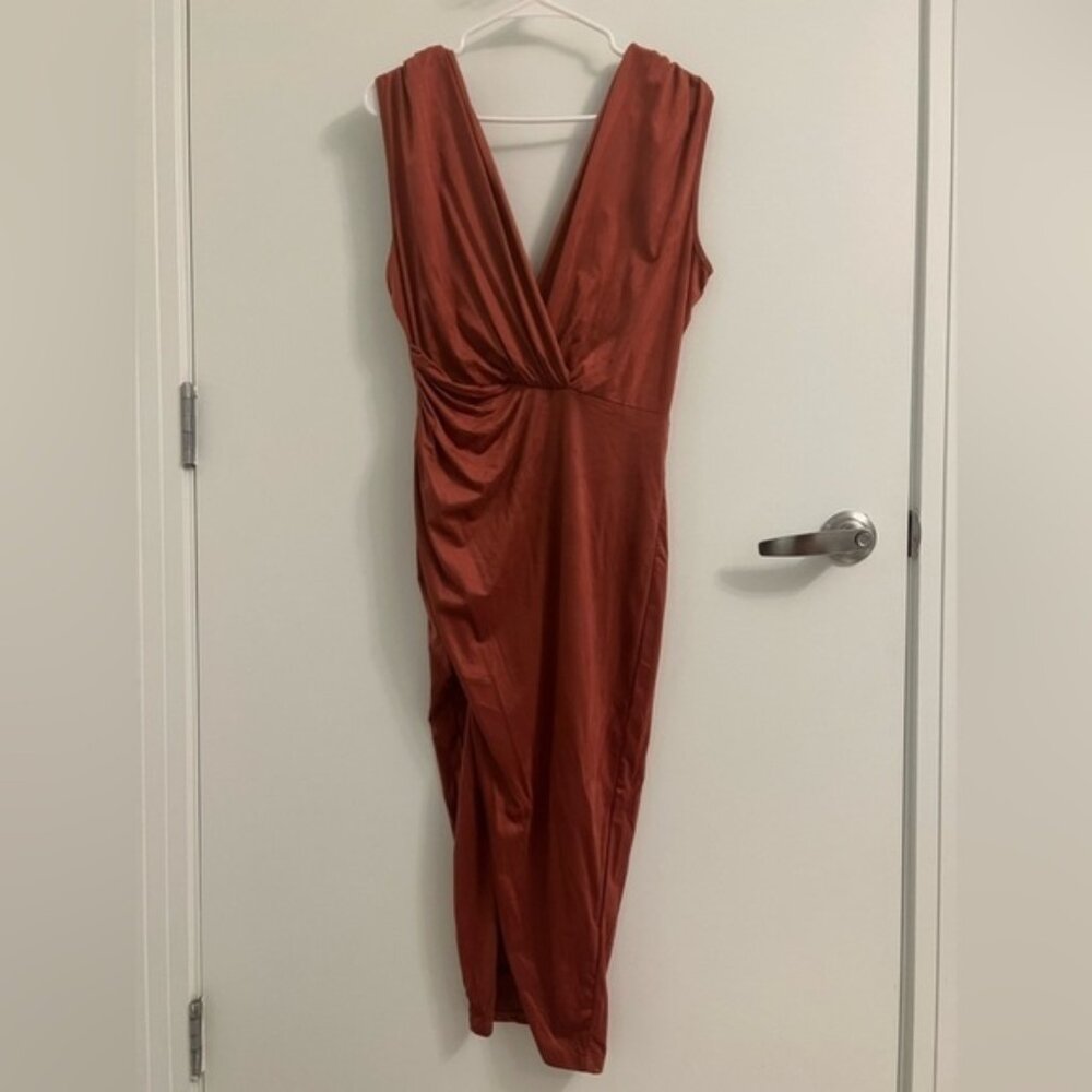 Brand new Fashionova cocktail dress, size medium with a split skirt